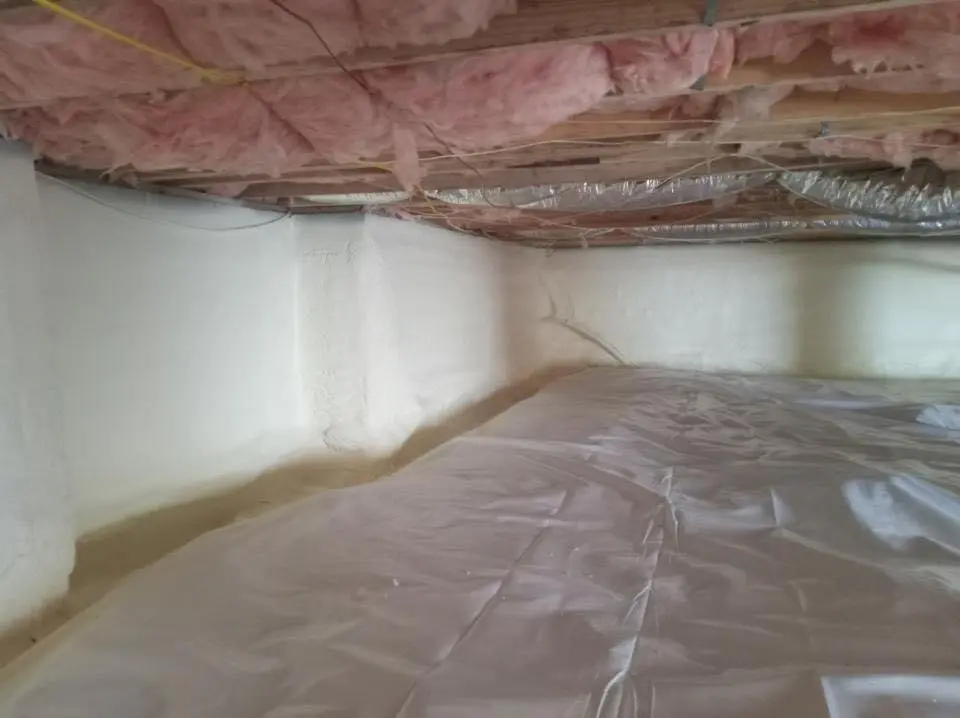 Crawl space encapsulation with closed-cell spray foam for Commercial Roof Restoration in Pleasantville